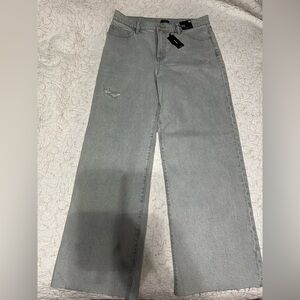 High Waisted Light Wash Ripped Raw Hem Wide Leg Jeans